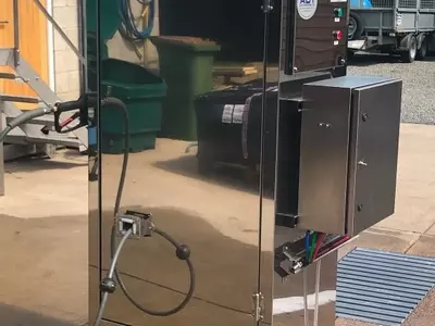 Completed stainless steel wheel wash system built into a DTE cabinet, designed for outdoor installation at a hatchery. This bespoke unit houses a CAT pump, multi-stage detergent system, internal hose reel, and water inlet tank to provide a controlled and 